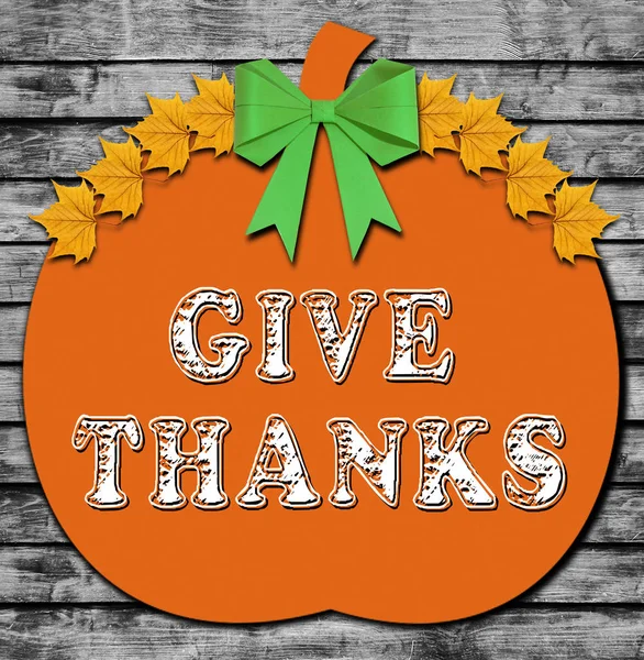 Happy thanksgiving, båge, pumpa och gula löv — Stockfoto