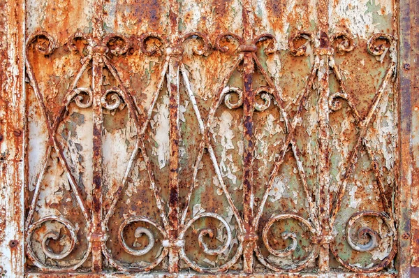 Rusty ornamental iron fence background — Stock Photo, Image