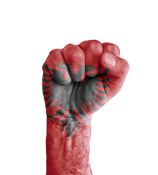 Vlag van Albanië geschilderd op menselijke vuist als symbool van de overwinning — Stockfoto