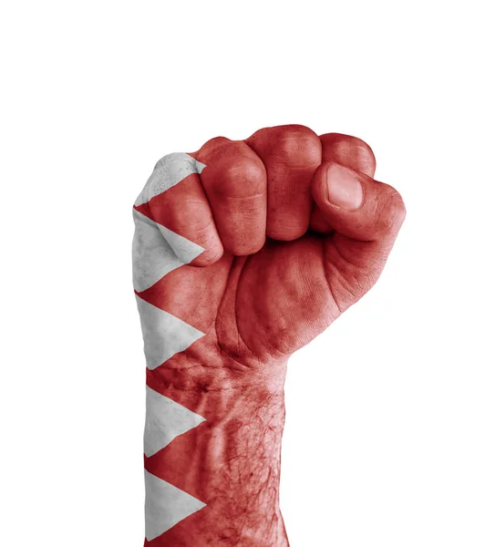 巴林国旗画在人类的拳头像胜利标志 — 图库照片