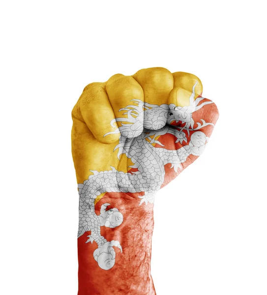 Прапор Бутану намальовані на людський кулак як символ перемоги — стокове фото