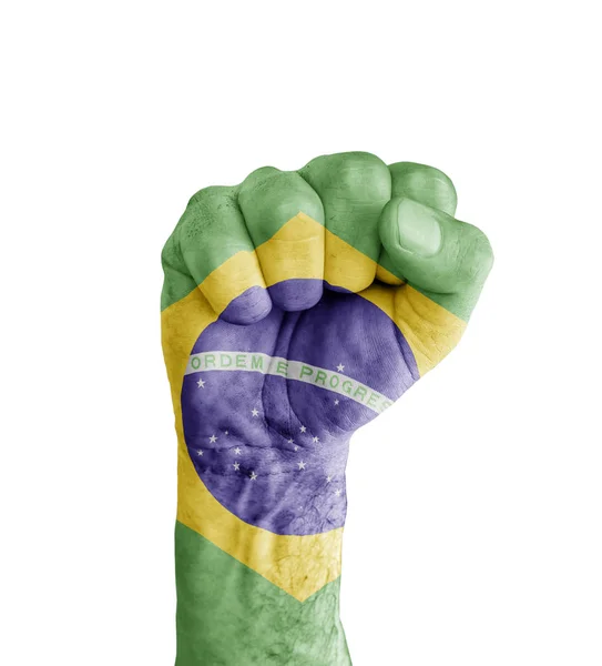 Brazília zászlaja festett emberi ököl, mint szimbólum győzelem — Stock Fotó
