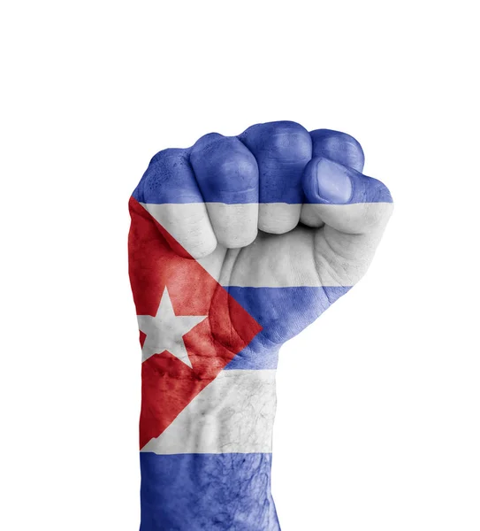 人間の拳の勝利の象徴のように描かれたキューバの旗 — ストック写真