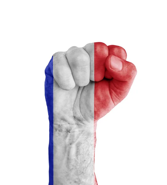Vlajka Francie namalované na lidské pěsti jako symbol vítězství — Stock fotografie
