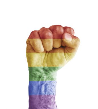 Flag of LGBT painted on human fist like victory symbol clipart