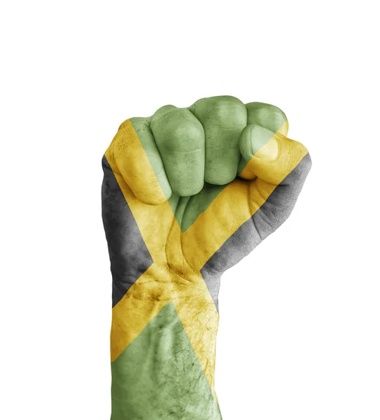 Flag of Jamaica painted on human fist like victory symbol — Stock Photo, Image