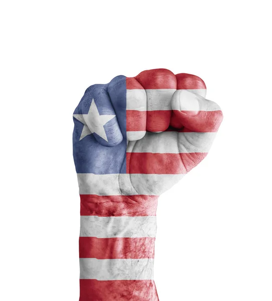 Bandera de Liberia pintada en puño humano como símbolo de victoria — Foto de Stock