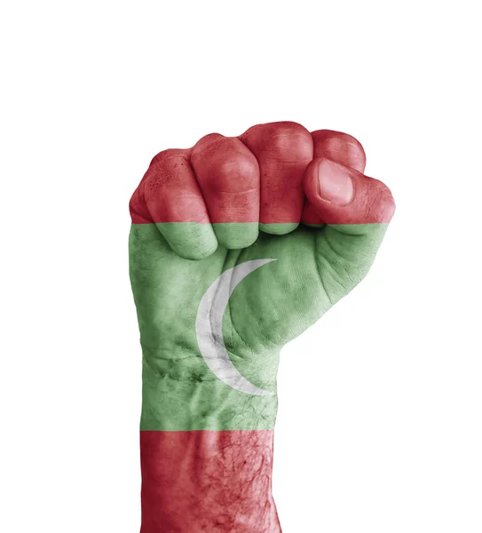 Emberi ököl, mint szimbólum győzelem festett Maldív-szigetek zászlaja — Stock Fotó