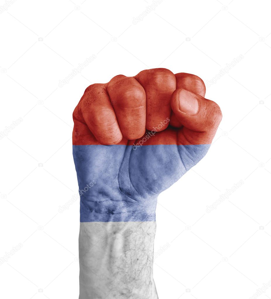 Flag of Republika Srpsk painted on human fist like victory symbo