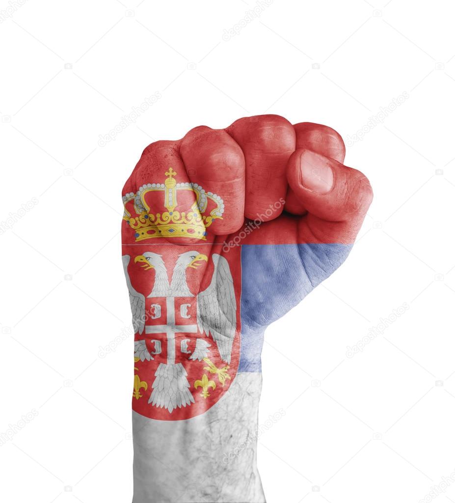 Flag of Serbia painted on human fist like victory symbol