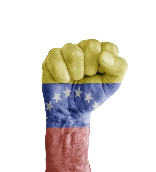 Venezuelská vlajka namalované na lidské pěsti jako symbol vítězství — Stock fotografie