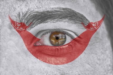 İnsan yüz ve göz Paskalya Adaları bayrağı ile boyalı