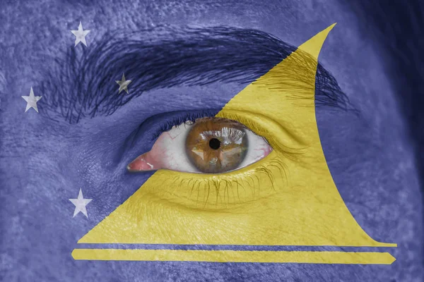Ανθρώπινο πρόσωπο και μάτια βαμμένα με σημαία του Τοκελάου — Φωτογραφία Αρχείου