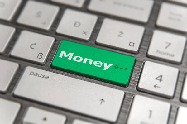 Teclado con tecla verde Introduzca y palabra botón de dinero moderno pc te —  Fotos de Stock