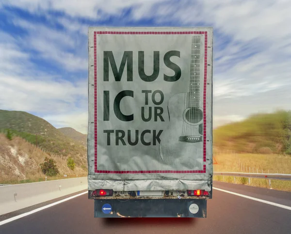 Back view of music tour truck cargo transport container on the h