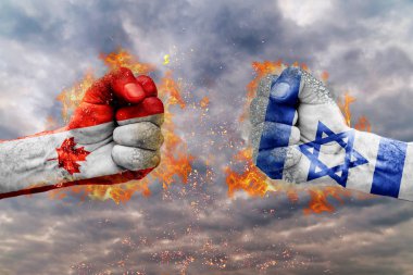 İki Kanada bayrağı ile yumruk ve İsrail birbirlerine karşı karşıya mücadele için hazır