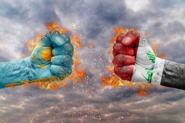 Kazakistan bayrağı ile iki yumruk ve Irak birbirlerine karşı karşıya mücadele için hazır