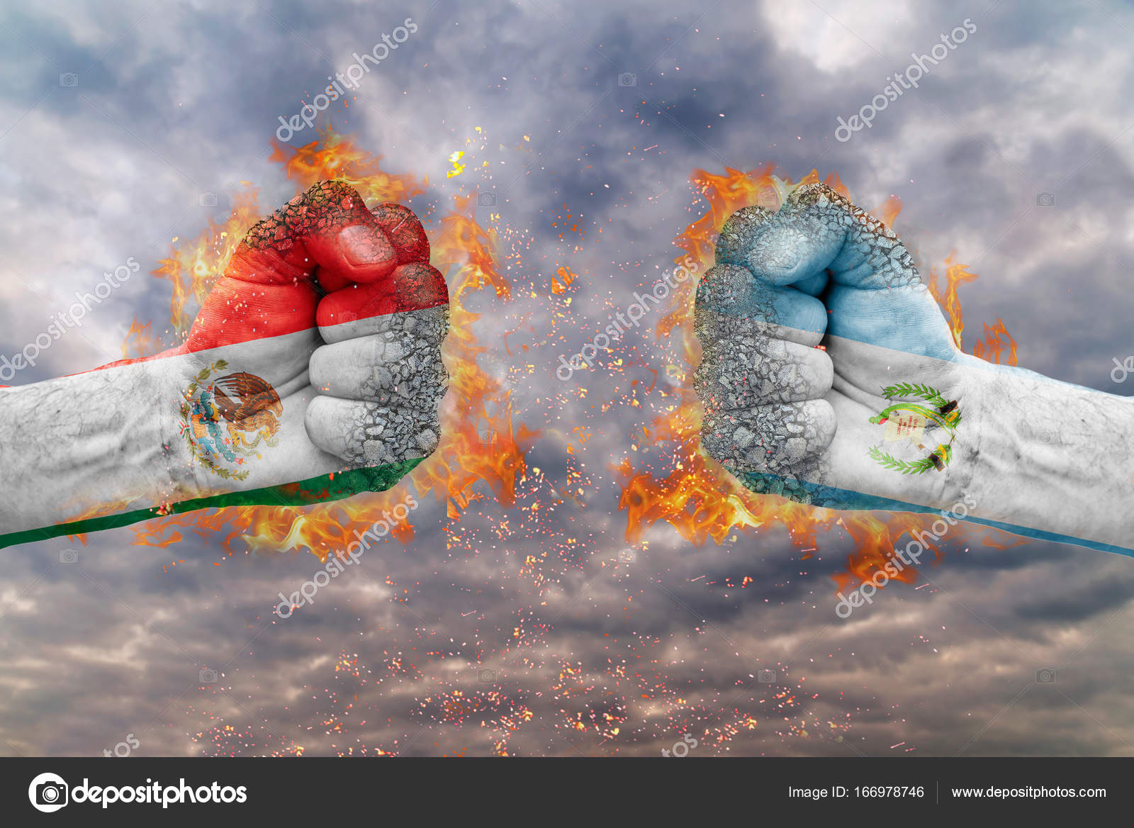 Two fist with the flag of Mexico and Guatemala faced at each other