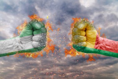 İki Nijerya bayrağı ile yumruk ve Benin birbirlerine karşı karşıya mücadele için hazır