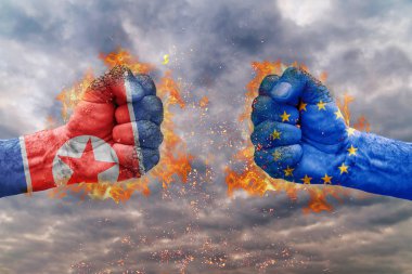 Kuzey Kore bayrağı ile iki yumruk ve AB birbirlerine karşı karşıya mücadele için hazır