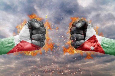 İki Filistin bayrağı ile yumruk ve Jordan birbirlerine karşı karşıya mücadele için hazır