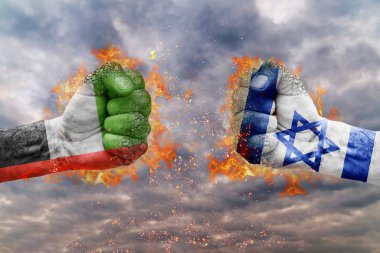 Birleşik Arap Emirlikleri bayrağı ile iki yumruk ve İsrail birbirlerine karşı karşıya mücadele için hazır