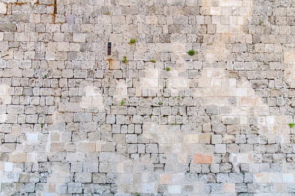 Castle wall like block and stone pattern of medieval concrete background