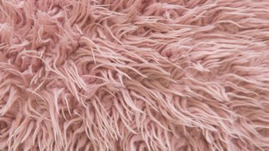  Parlak renkler ve moda eğilimleri. Pembe yapay kürk doku yakın çekim