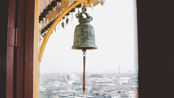 Buddhist bells in the monastery close-up. Wat Saket in Bangkok - Temple of the Golden Mount — Stock Photo, Image