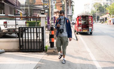 Bangkok, Tayland - 21 Şubat 2020: Coronavirüs enfeksiyonu Covid-19. Şehirdeki enfeksiyonu önlemek için güvenlik tedbirleri