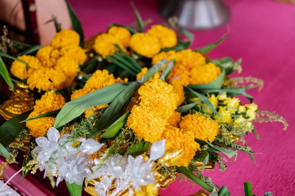 Buddhist tradition of worship and flower offering to monks