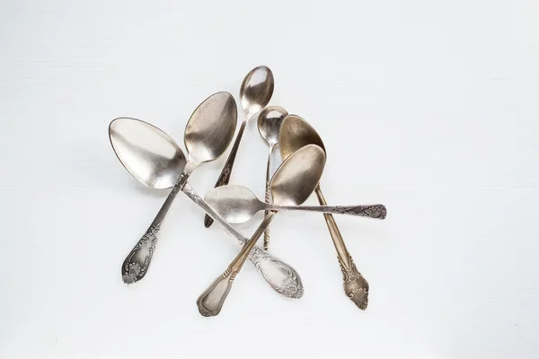 Silver spoons on white background — Stock Photo, Image