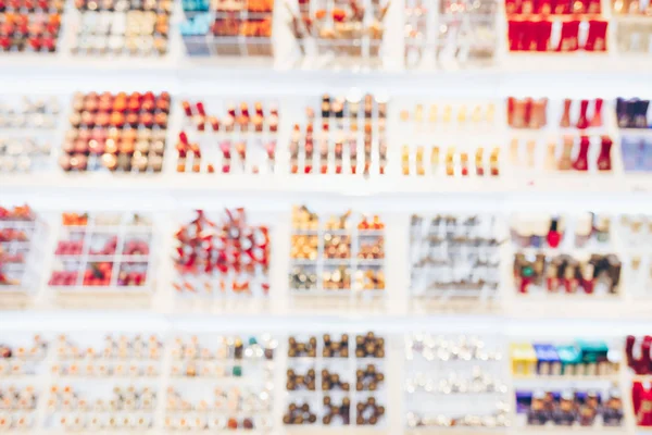Blurred shelf with cosmetics. — Stock Photo, Image