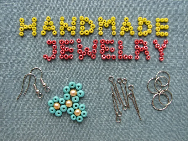 Inscription made of beads, handmade jewelry, furniture and tools