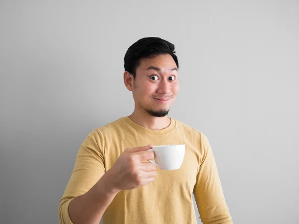 Asian man drinks coffee. — Stock Photo, Image