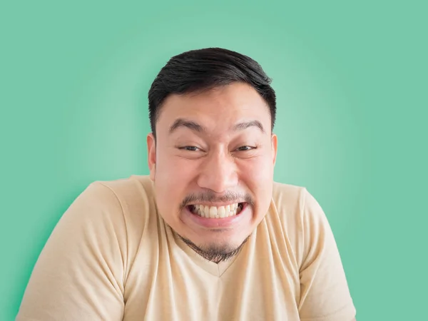 Headshot of funny guilty Asian man. — Stock Photo, Image