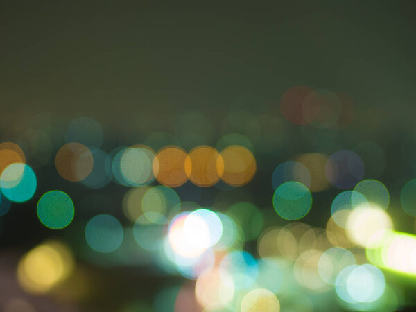 Colorful bokeh lights of night cityscape.