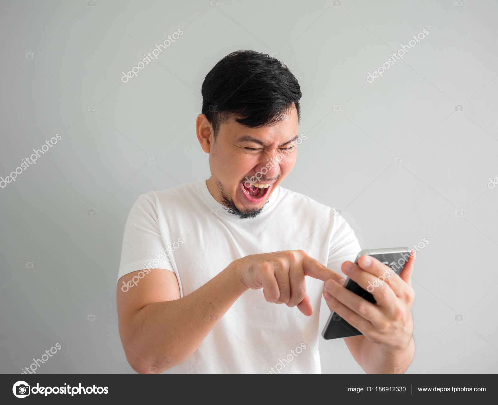 Funny laugh face of man watching funny video clip share in socia Stock Photo by ©sevendeman 186912330 Funny laugh face of man watching funny video clip share in socia Stock Photo by ©sevendeman 186912330