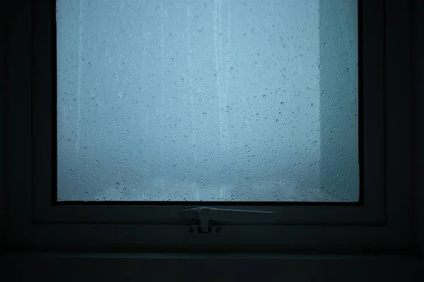 Rains run through the windows of the condominium room. — 스톡 사진