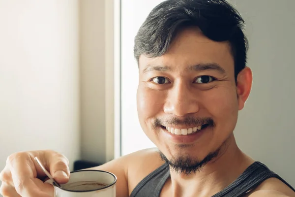 Happy smile man selfie himself with a cup of coffee in a warm cozy day. — Stock Photo, Image