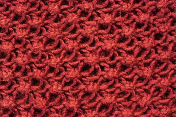 Knitted burgundy pattern close up background — Stock Photo, Image