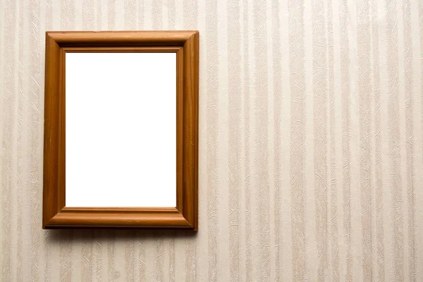 Wooden empty frame on wall with wallpaper in stripes. For your text