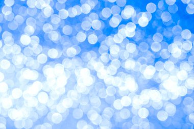 Soyut mavi renk odaklanmış bokeh arkaplanı.