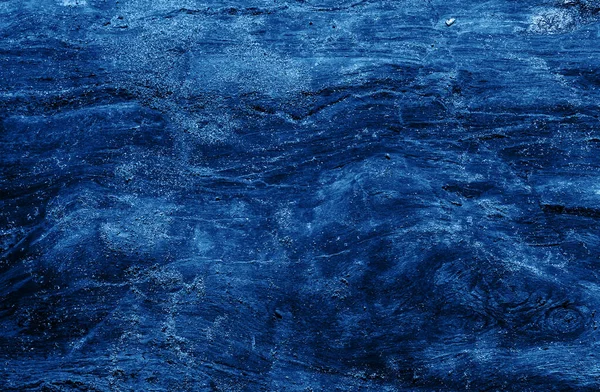 Draufsicht auf dunklen Steinhintergrund in blauer Farbe. — Stockfoto