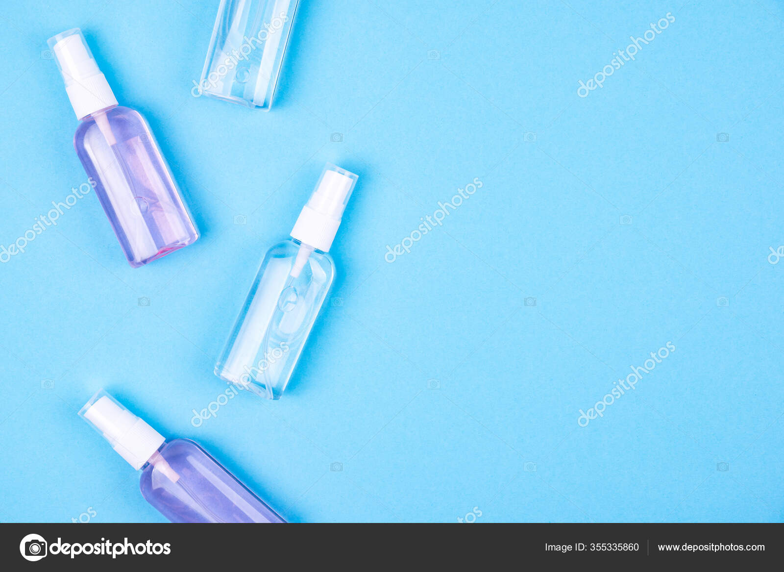 Top View Antibacterial Antiseptic Spray Hands Sanitizer Blue Background