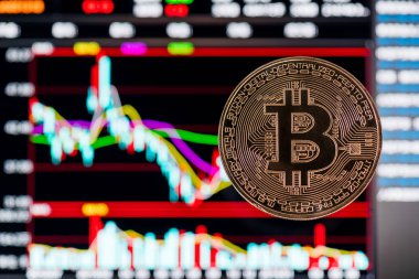 Bitcoin arka planda renkli grafiklerle