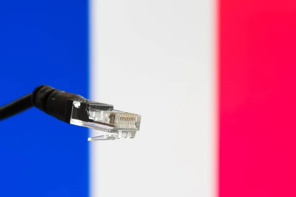 Ethernet καλώδιο με γαλλική σημαία στο παρασκήνιο — Φωτογραφία Αρχείου