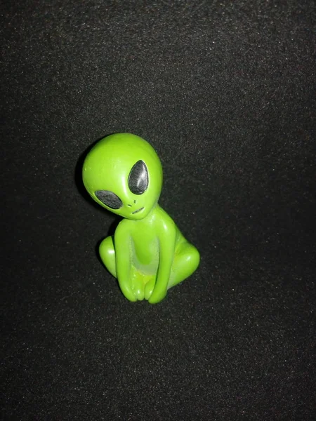 alien floating in space
