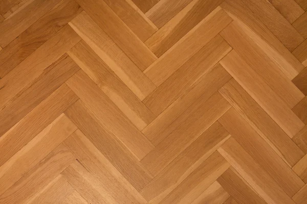 Parquet de espinha de peixe, piso em parquet de madeira — Fotografia de Stock