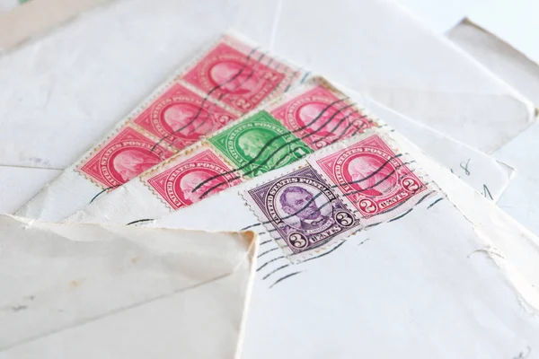 many old letters, envelopes postal stamps